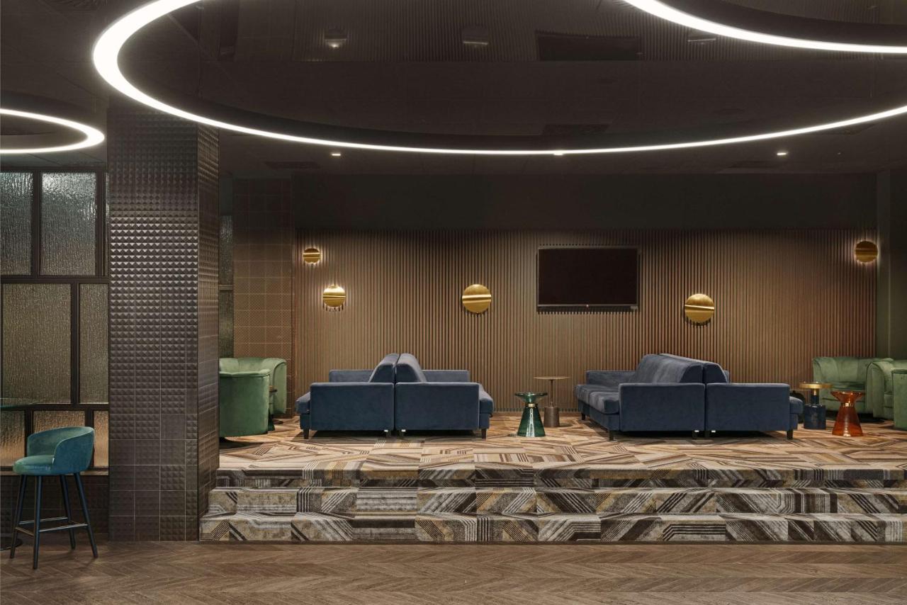 Radisson Blu Resort & Conference Center, Ostroda Mazury Bagian luar foto The interior of the lounge
