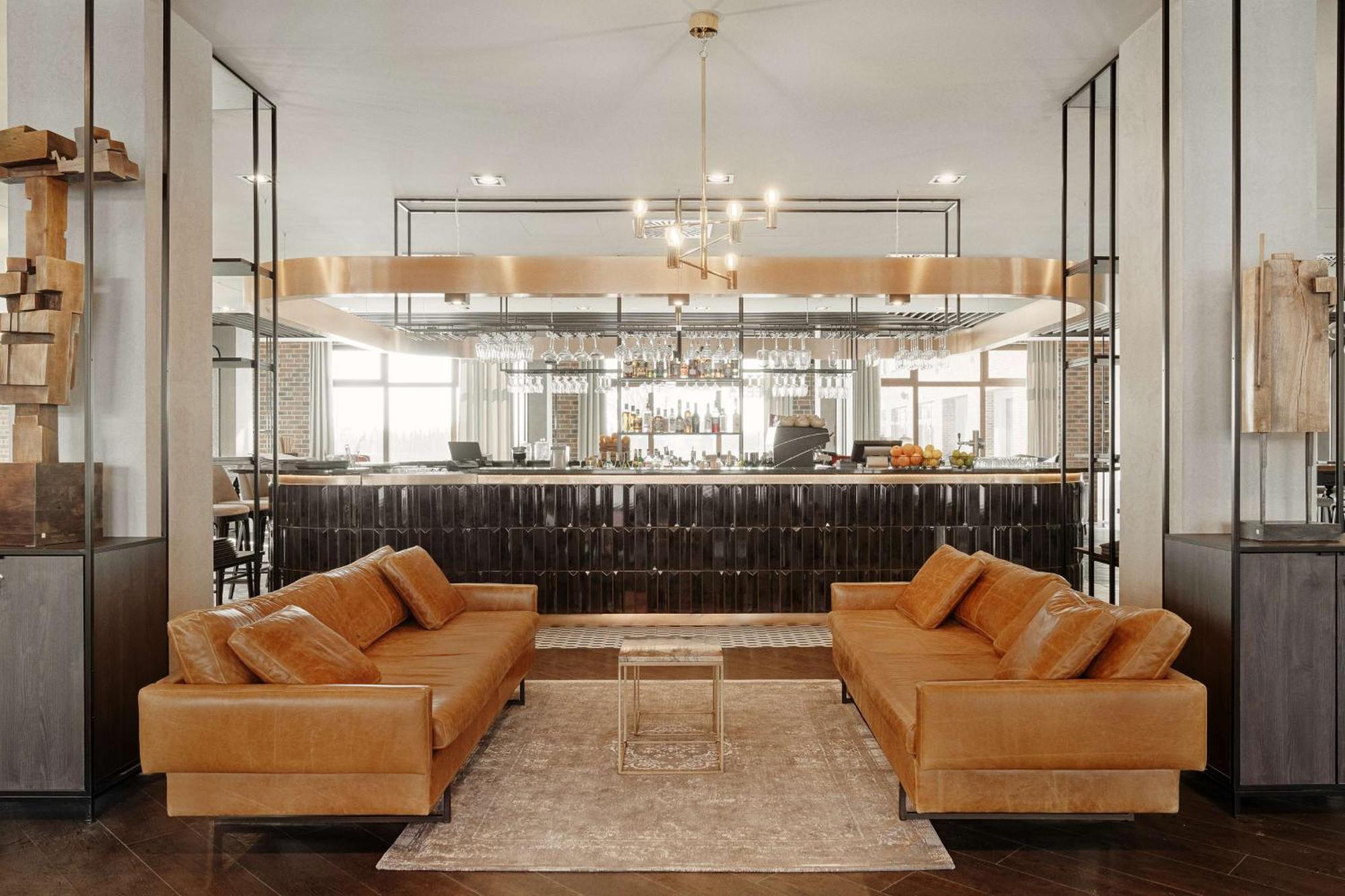 Radisson Blu Resort & Conference Center, Ostroda Mazury Bagian luar foto The bar at the 100 East 53rd Street location